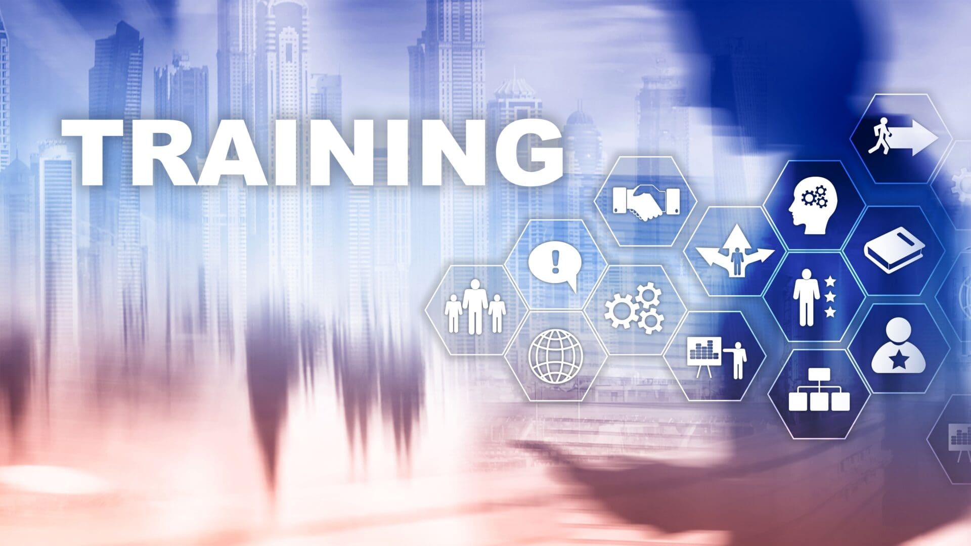 A picture of the word training with various icons.