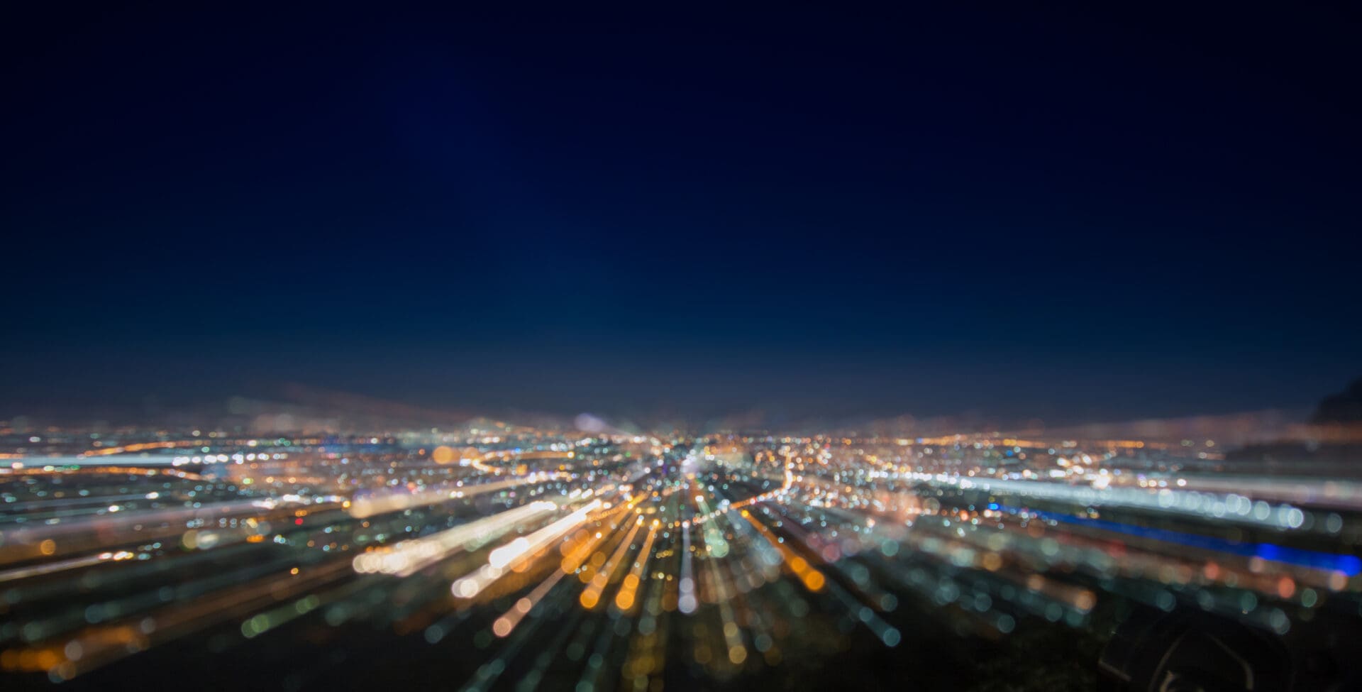 Abstract long exposure, experimental surreal photo, city and vehicle lights at night