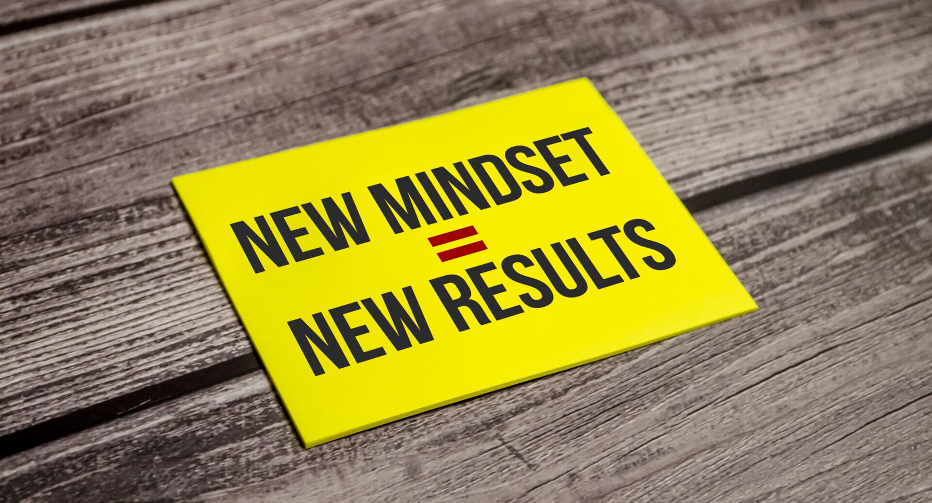 New Mindset - New Results on yellow sticker and wooden background